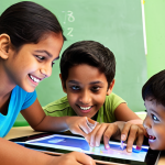 Interactive Learning & Creativity**
"A group of diverse, happy children (around 5-8 years old, potentially with South Asian features) are actively engaged with a vibrant, interactive digital learning platform, possibly on a tablet or large screen. They are pointing, discussing, and smiling, demonstrating deep concentration and excitement as they solve problems and make choices within an animated story. The setting is bright and imaginative, symbolizing a 'new journey' in digital education that fosters creativity, critical thinking, and a sense of active participation."

**